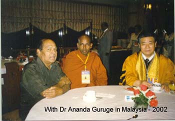 2002 - December with Dr Guruge at the meeting Global conference on Buddhism in Malaysia.jpg